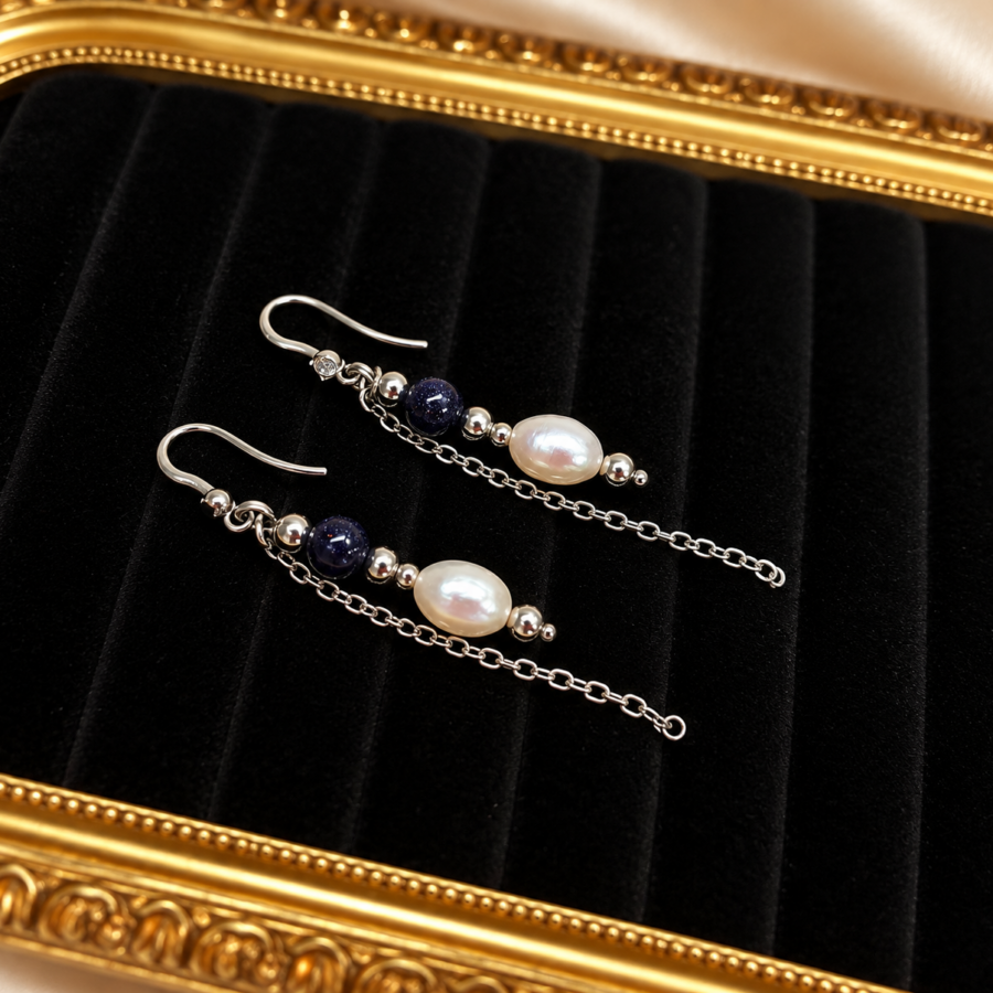 zilveren oorbellen met barokparels blauwe goudsteen grand jewellery pm