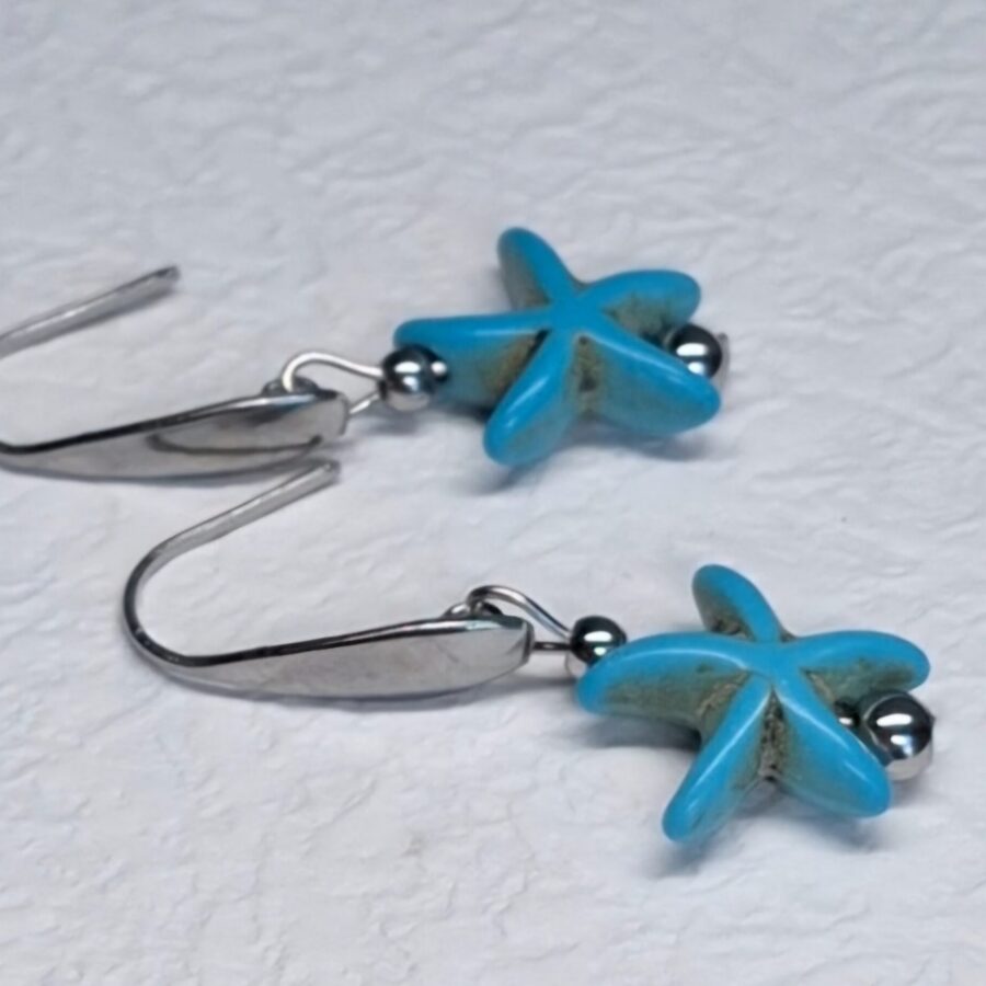 zilveren oorbellen met turquoise zeester