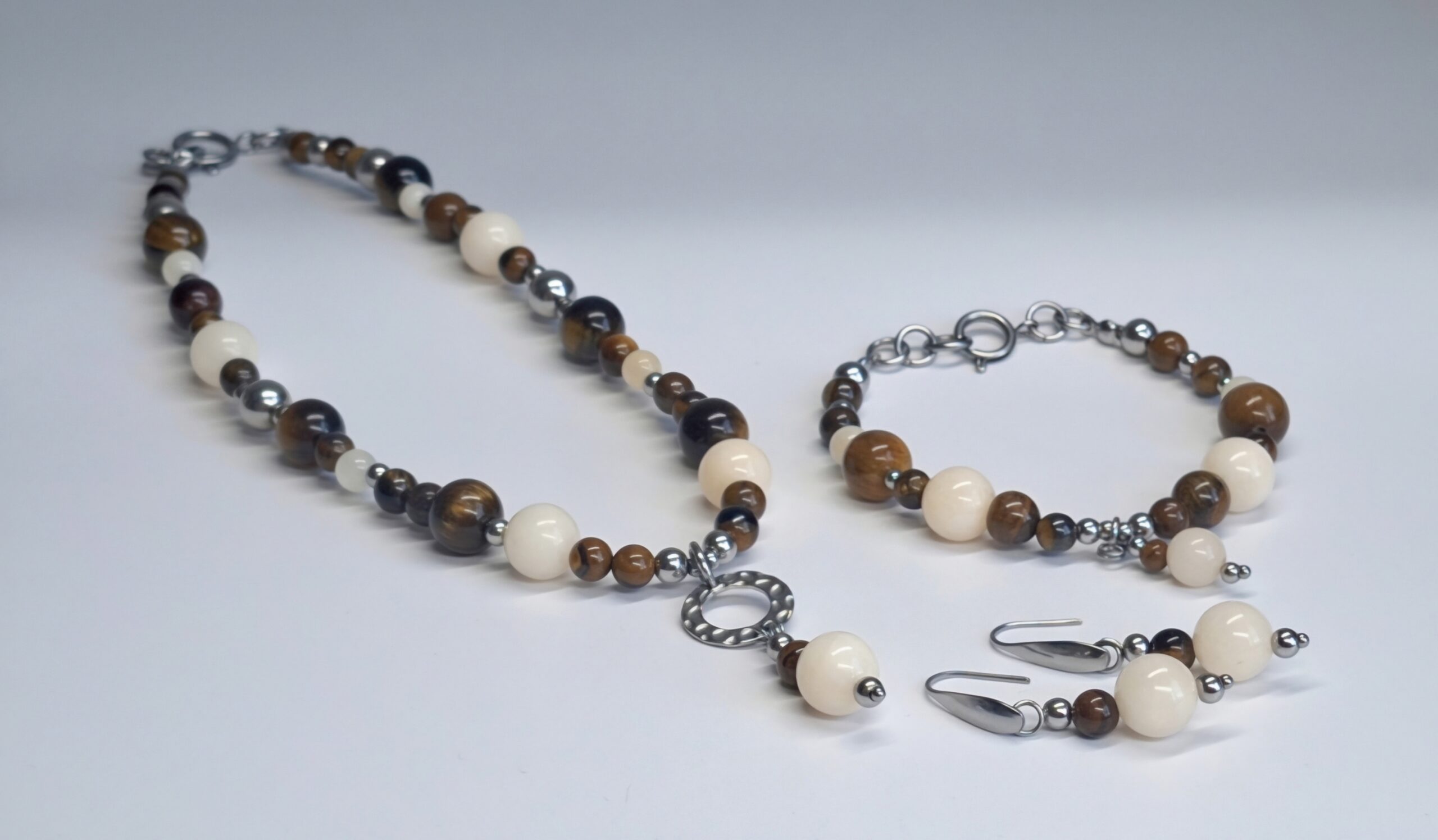 zilveren set met tijgeroog en angeliet zilveren set met tijgeroog en angeliet